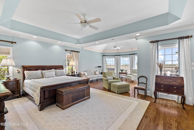 8904 Sound View Ct, Emerald Isle, NC 28594 - bedroom with recessed lighting, crown molding, wood finished floors, and a raised ceiling