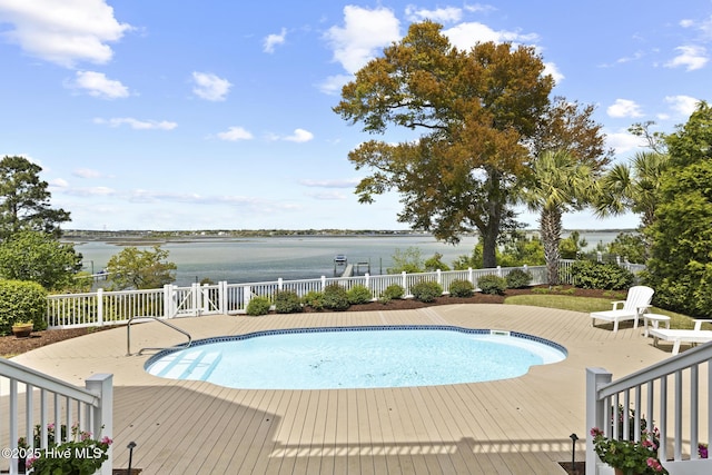 8904 Sound View Ct, Emerald Isle, NC 28594 - view of pool featuring a deck with water view, fence, and a fenced in pool