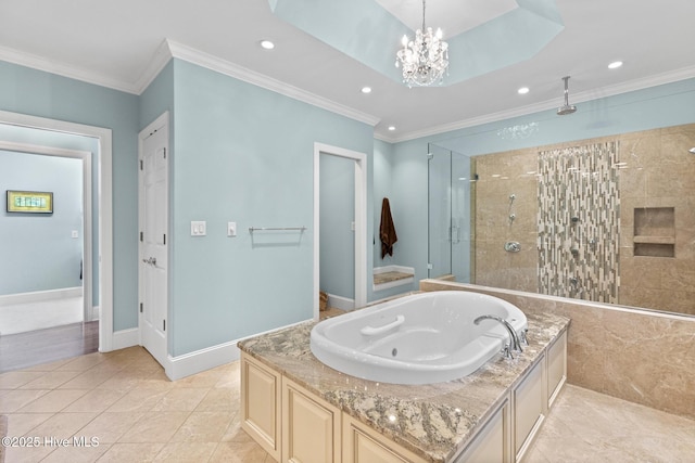 8904 Sound View Ct, Emerald Isle, NC 28594 - bathroom with crown molding, tiled shower, an inviting chandelier, a jetted tub, and recessed lighting
