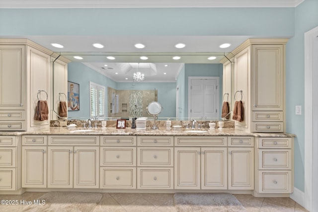 8904 Sound View Ct, Emerald Isle, NC 28594 - full bath with ornamental molding, tile patterned flooring, a sink, and double vanity