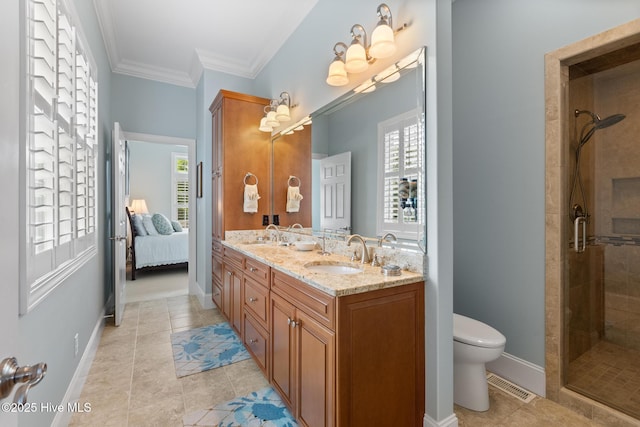 8904 Sound View Ct, Emerald Isle, NC 28594 - ensuite bathroom with visible vents, a sink, a shower stall, and toilet