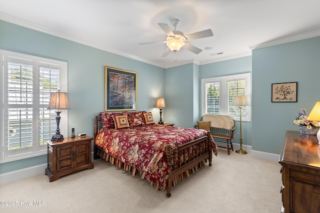 8904 Sound View Ct, Emerald Isle, NC 28594 - bedroom featuring light carpet, multiple windows, visible vents, and baseboards