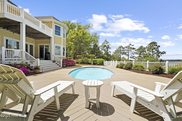 8904 Sound View Ct, Emerald Isle, NC 28594 - view of swimming pool featuring a fenced in pool, a fenced backyard, and a deck