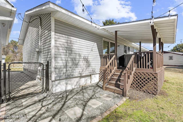 exterior space with fence and a gate