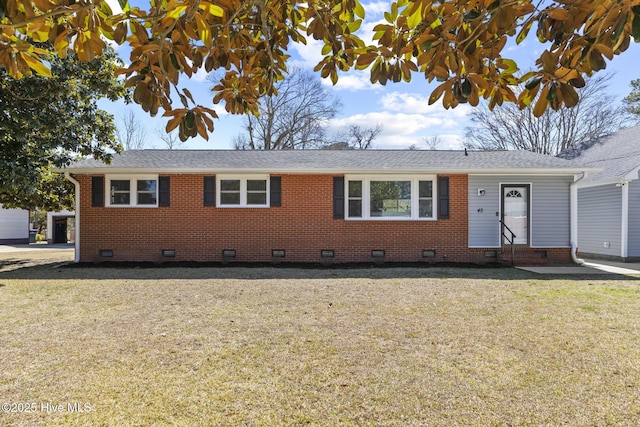 ranch-style house with brick siding, a shingled roof, a front lawn, entry steps, and crawl space