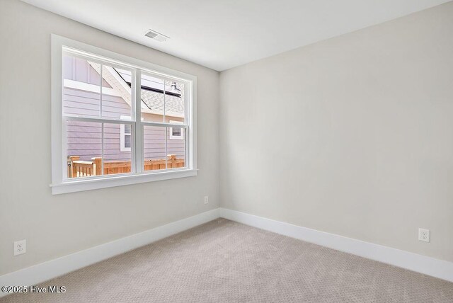 1340 Trisail Ter, Wilmington, NC 28412 - unfurnished room featuring carpet and baseboards
