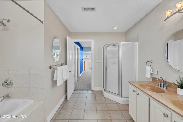 carpeted bedroom featuring ceiling fan, baseboards, visible vents, and a textured ceiling