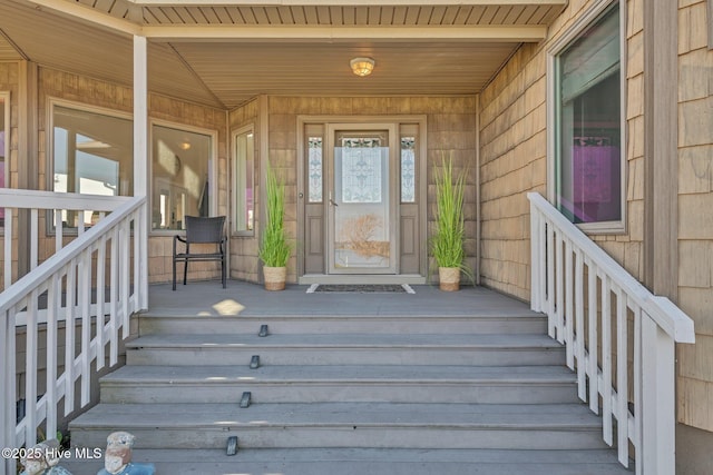 entrance to property with a porch