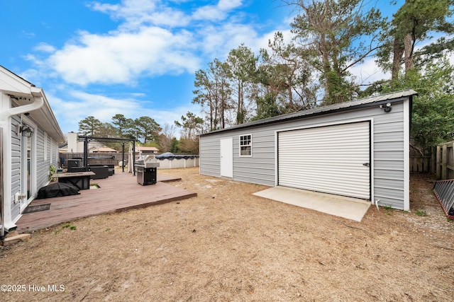 garage with fence