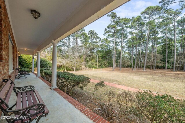 view of patio featuring a porch