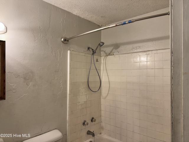 2604 Robeson St, Wilmington, NC 28405 - full bath with a textured ceiling, shower / bathtub combination, and toilet