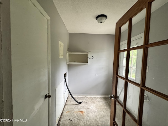 2604 Robeson St, Wilmington, NC 28405 - unfurnished room featuring baseboards and a textured ceiling
