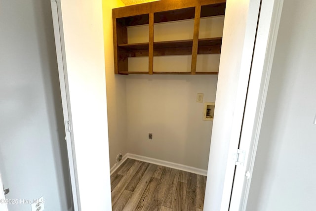 laundry area featuring hookup for a washing machine, wood finished floors, baseboards, hookup for an electric dryer, and laundry area