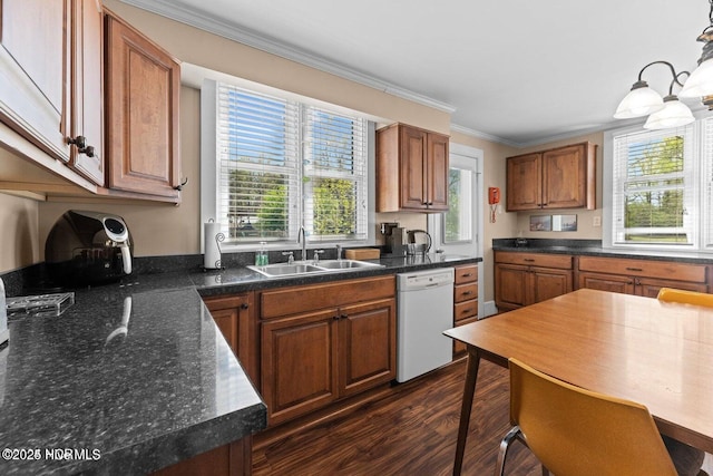 kitchen featuring dark wood finished floors, ornamental molding, a sink, dishwasher, and brown cabinets