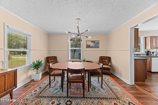 dining area with visible vents, dark wood-style floors, ornamental molding, and a chandelier