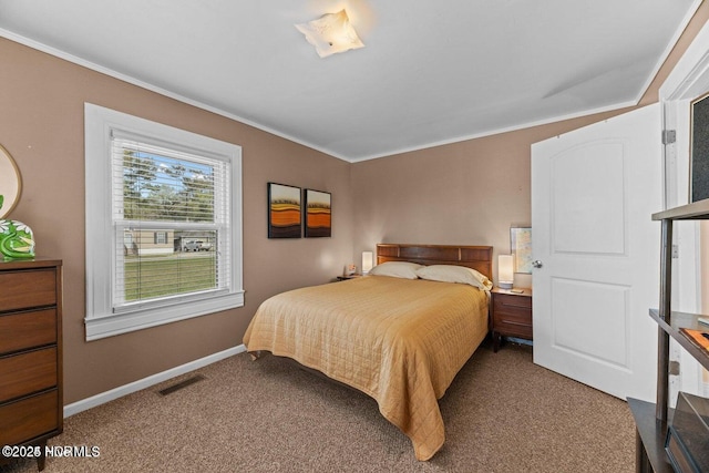 bedroom featuring ornamental molding, carpet, visible vents, and baseboards