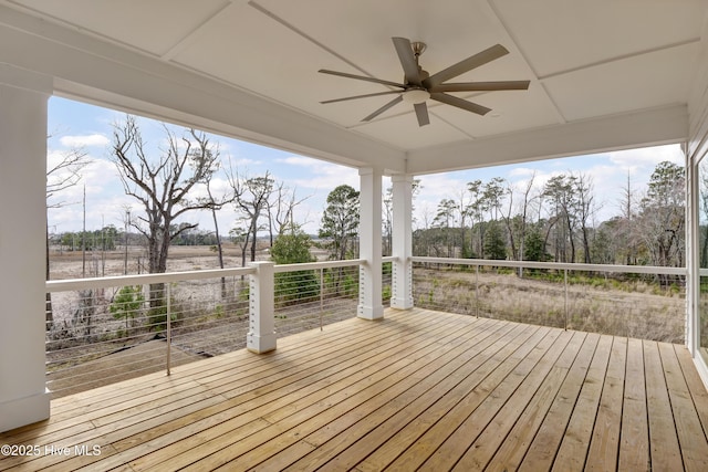 wooden deck featuring ceiling fan