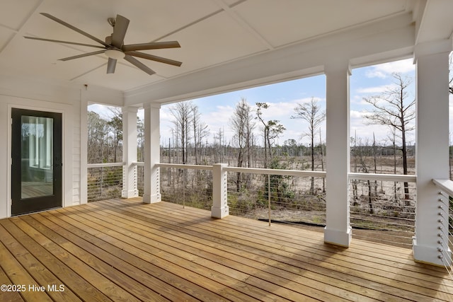 wooden terrace featuring ceiling fan