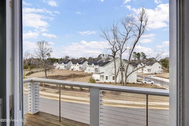 balcony featuring a residential view