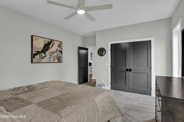 bedroom featuring baseboards, carpet, and ceiling fan