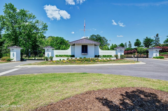 view of front of property featuring metal roof and a standing seam roof