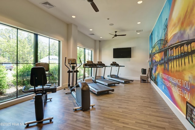 exercise room with visible vents, baseboards, ceiling fan, recessed lighting, and wood finished floors