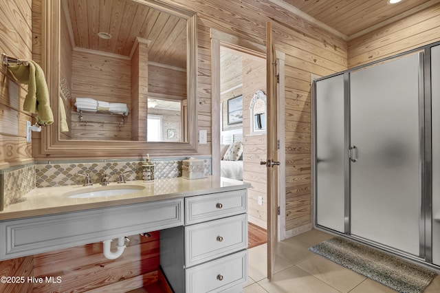 full bath featuring tile patterned floors, wooden walls, a shower stall, and wooden ceiling