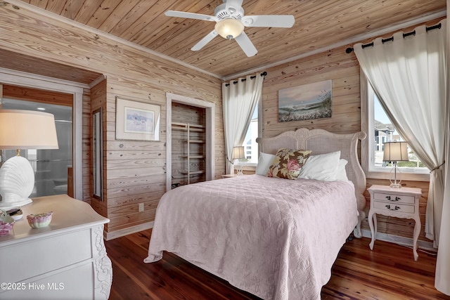 bedroom with dark wood-type flooring, multiple windows, wood ceiling, and wood walls