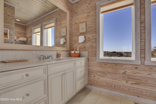 bathroom with vanity and tile patterned floors