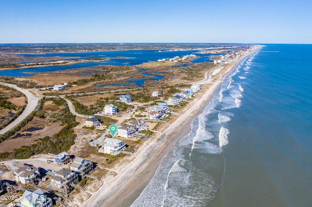 aerial view with a beach view and a water view