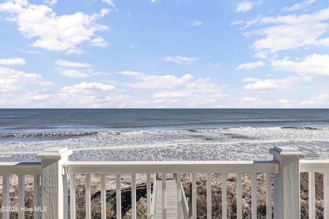 property view of water featuring a beach view