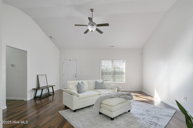 living area featuring baseboards, high vaulted ceiling, wood finished floors, and a ceiling fan