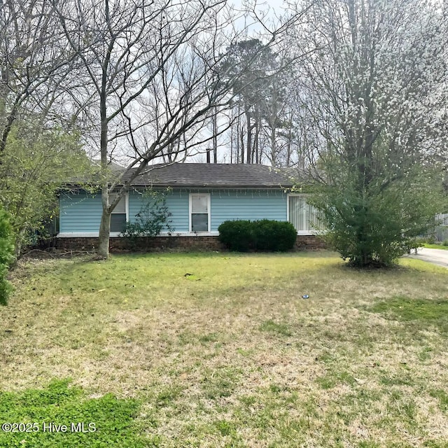 view of front of house with a front yard