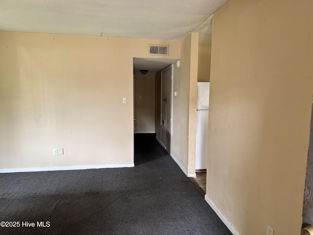 1122 E Stewart Cir, Wilmington, NC 28405 - unfurnished room with dark colored carpet and baseboards