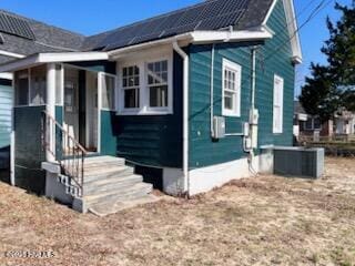 view of home's exterior featuring central AC