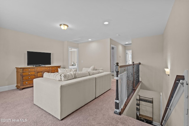 living room with carpet flooring, recessed lighting, and baseboards