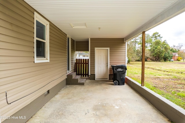 view of patio with an attached carport and entry steps