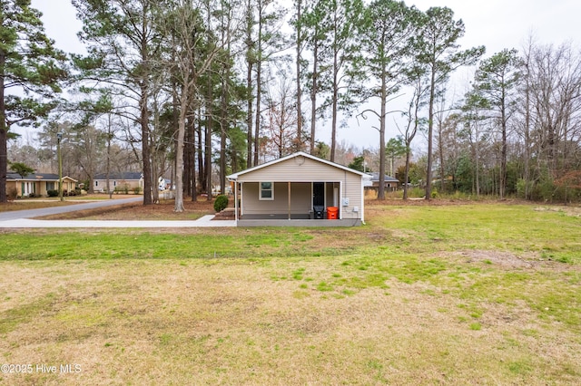 view of front of property with a front yard and a porch