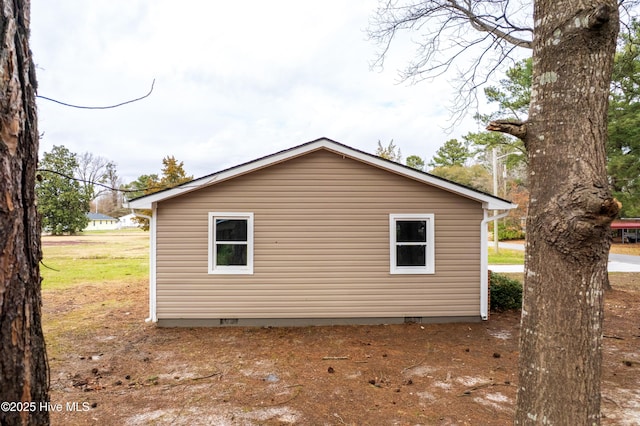 view of side of property featuring crawl space