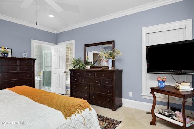 bedroom with ceiling fan, ensuite bathroom, baseboards, ornamental molding, and light carpet