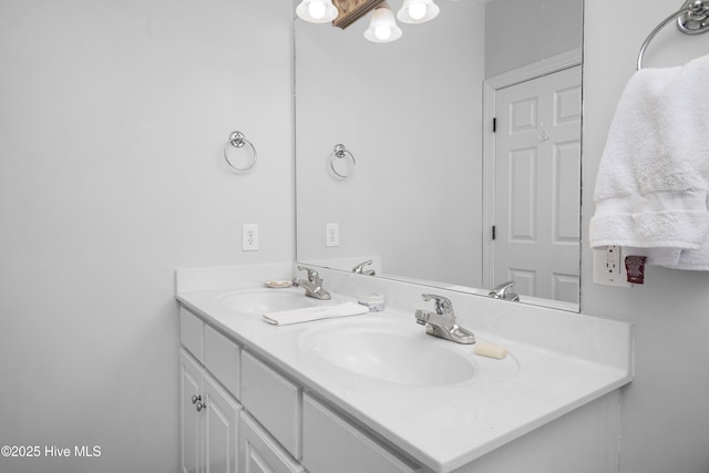 bathroom with double vanity and a sink