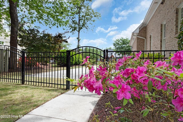 view of gate featuring fence
