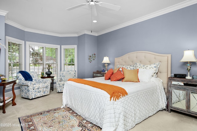 bedroom featuring ornamental molding, ceiling fan, and carpet flooring