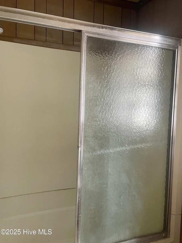 full bathroom with an enclosed shower