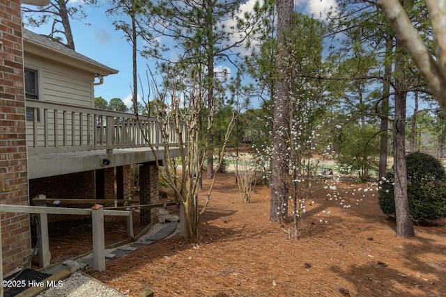 view of yard featuring a deck