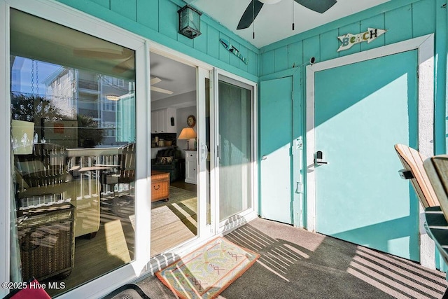 balcony featuring a ceiling fan