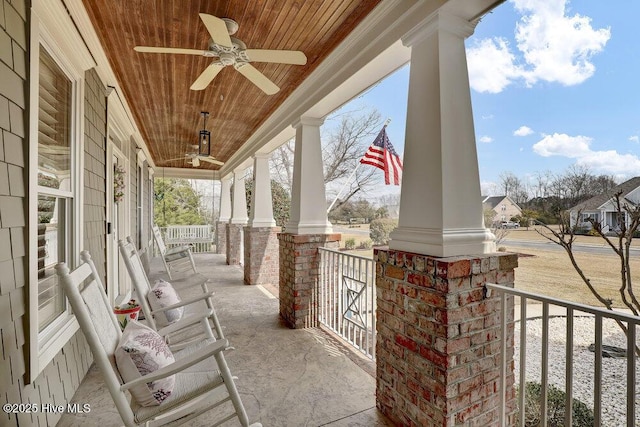 view of patio with a porch and a ceiling fan