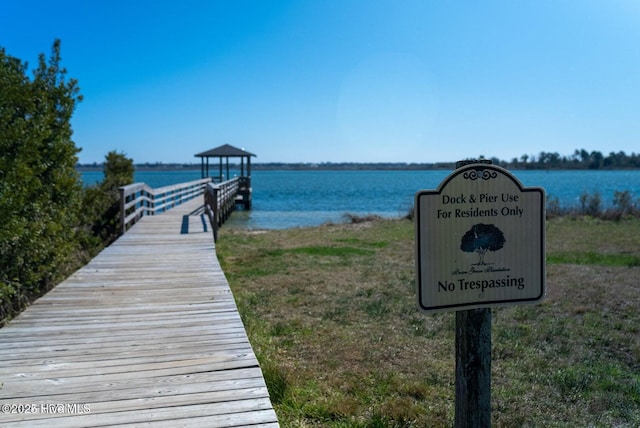 108 Cottage Walk, Hampstead, NC 28443 - dock area featuring a water view