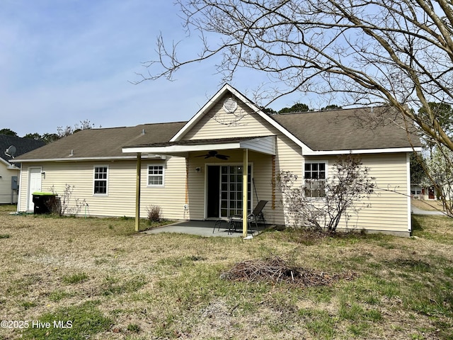 back of house featuring a patio area, a yard, and a ceiling fan