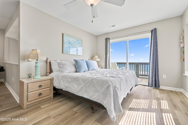 bedroom with light wood finished floors, visible vents, ceiling fan, baseboards, and access to outside